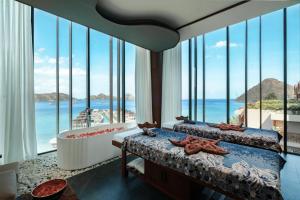 a hotel room with a view of the ocean at Katamaran Hotel & Resort Komodo in Labuan Bajo