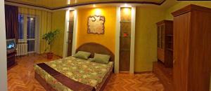 Ένα ή περισσότερα κρεβάτια σε δωμάτιο στο Apartment on Hrushevskoho 28