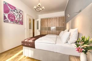 Postel nebo postele na pokoji v ubytování Maiselova 5 Apartment