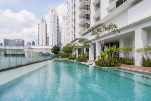 a swimming pool in the middle of a building at Veone Hotel Kuala Lumpur in Kuala Lumpur