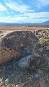 a large rock in the middle of a field at Old stones glamping in Chok-Tal