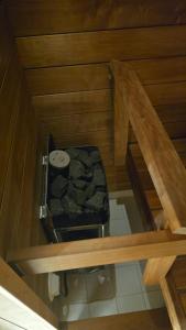 an overhead view of a box in a wooden room at LinnankadunHelmi in Savonlinna