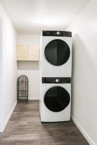 a kitchen with two microwaves stacked on a wall at Mountain Views - Peaceful Retreat - 1BR suite in Sooke