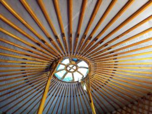 a ceiling with a window in the middle at La yourte gasconne in Estampures