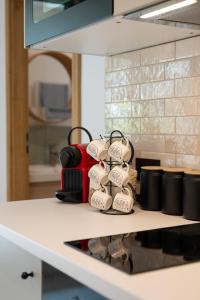 a pile of paper towels sitting on top of a counter at Asini deluxe suite 2, with rooftop terrace and breathtaking views in Asíni +48 photos