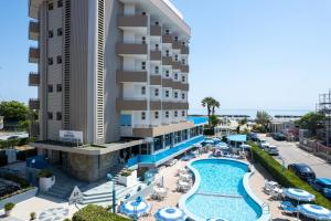 an aerial view of a hotel with a swimming pool at Hotel Concord in Lido di Savio