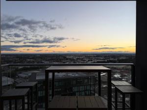 a view of a city from the top of a building at Luxurious City View with Gym Pool Parking Playground in Sydney