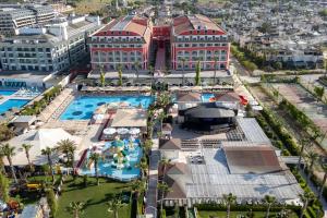 an aerial view of a resort with a pool at Orange County Belek in Belek