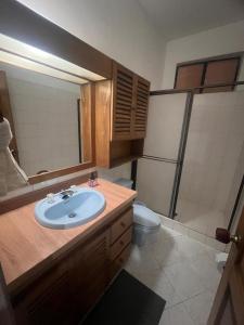 a bathroom with a sink and a toilet at Casa Vacacional San Gil Santander in San Gil +1 photo