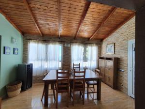 a dining room with a table and chairs at Villa Perdomo in Las Palmas de Gran Canaria