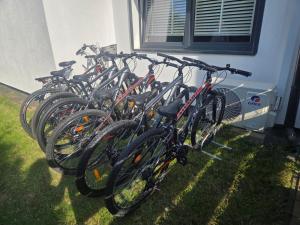 a group of bikes parked next to a building at Mierzyn Po Drodze in Mierzyn