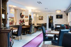 TV a/nebo společenská místnost v ubytování Hotel Berg
