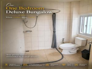 a bathroom with a shower and a toilet at Annabel's Resort in Ferrol +24 photos