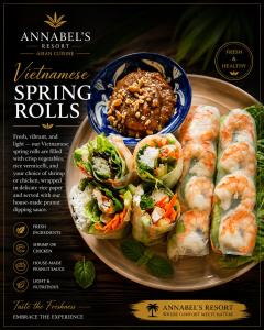 a plate of food with shrimp rolls and a bowl of sauce at Annabel's Resort in Ferrol