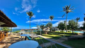 a view of a resort with a pool and palm trees at Mtwapa Beach Nest D3 in Mtwapa
