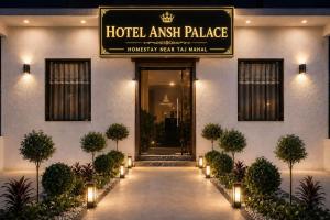 a hotel entrance with a sign that reads hotel embassy palace at Hotel Ansh Palace - Village Near Taj Mahal Agra in Tājganj
