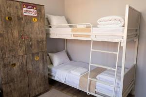 a bunk bed room with two bunk beds at BESQALA in Nukus +32 photos