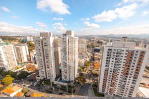 an aerial view of a city with tall buildings at Flat Premium Design Moderno, Completo in Osasco