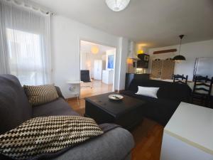 a living room with a couch and a table at Vistas de Ronda in Ronda