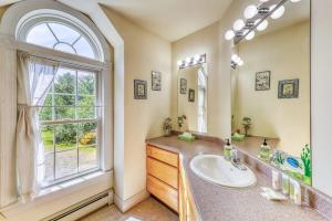 a bathroom with a sink and a window at Franconia's Far Far Away in Franconia +53 photos