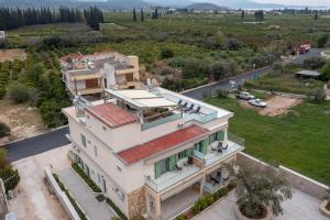 an aerial view of a house at Asini deluxe suite 5, with rooftop terrace and breathtaking views in Asíni