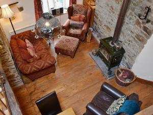 an overhead view of a living room with furniture at The Old Barn in Abbotsham