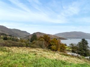 a view of lochalsh from a hill with mountains at Totaig - Uk50717 in Kirkton