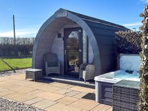a gazebo with a hot tub in it at The Appleton - Ukc9283 in Brompton
