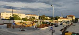 a parking lot with a skate park in a city at Quina'sHouse in Rossio ao Sul do Tejo
