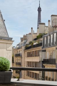 a view of the eiffel tower from a balcony at Plaza Tour Eiffel in Paris