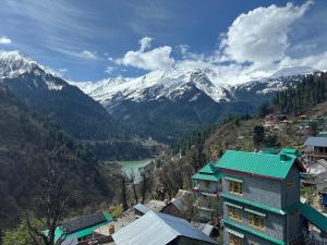 a view of a mountain with snow covered mountains at The Soul Himalaya in Tosh