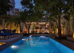 a swimming pool in the middle of a building at Special offer at 22 by spacey #54 Studio in Maadi in Cairo
