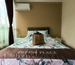 a bag sitting on a bed in a bedroom at Sunny Cozy Apartment Primorsko in Primorsko +9 photos