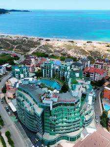 an aerial view of a resort near the ocean at Sunny Cozy Apartment Primorsko in Primorsko