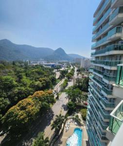 a view of a city from a building at Flat & Suite Premium - Rio Centro - Barra - Farmasi Arena in Rio de Janeiro
