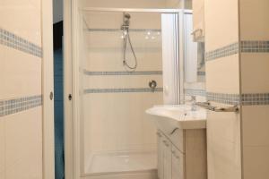 a bathroom with a shower and a sink at Villaggio Baia Dei Lombardi in Vieste +52 photos