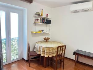 a dining room with a table and chairs at Casa Il Muro in Citta' Sant'Angelo +20 photos