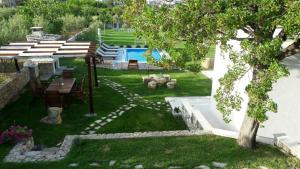Vonkajšia záhrada v ubytovaní Luxury Villa Luminosa