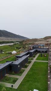 an overhead view of a building with green grass at Пан0рама in Saty