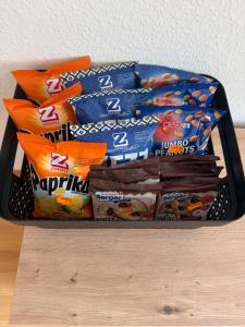 a tray filled with different types of snacks at Apartment in Reigoldswil in Reigoldswil +1 photo