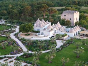 an aerial view of a mansion with a garden at Trulli Damari in Locorotondo