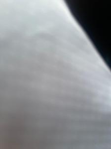 a close up of a person wearing a white shirt at Lora luxury in Al Mudawwarah