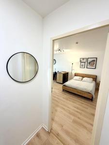 Llit o llits en una habitació de Studio le Devosge
