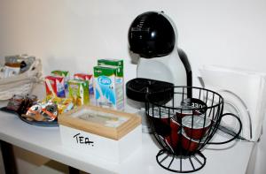 a counter with a mixer and a basket on it at Loft vista mare in Silvi Marina