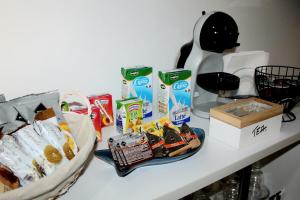a counter top with a bunch of food on it at Loft vista mare in Silvi Marina