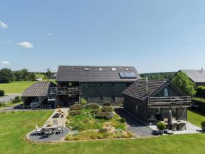 an aerial view of a house with a garden at Cocoon in Houffalize