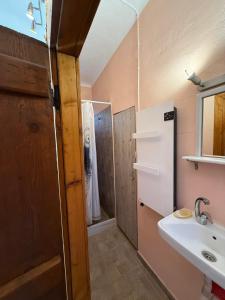 a bathroom with a sink and a shower at Sparta Gaia Retreat in Áyios Dhimítrios +51 photos