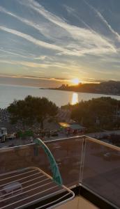 a view of a sunset from the roof of a building at Marina in Shëngjin