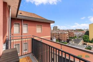 a balcony with a view of a city at MILANO Bicocca Niguarda a 15min dal DUOMO in Milan