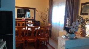 a dining room with a table and chairs and a dining room at Villa Alois in Konispol